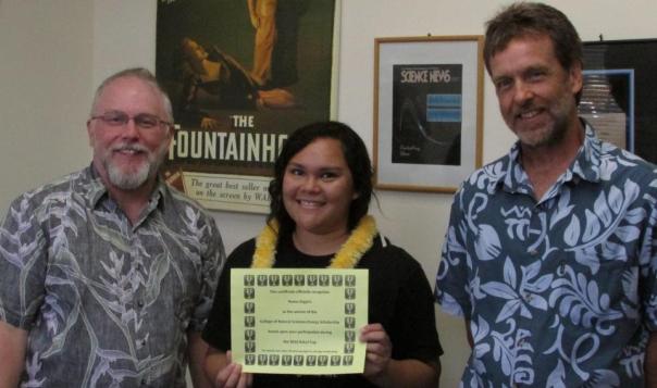 Ileana Argyris receiving the 2012 CNS Energy Scholarship. Dean William Ditto is the left and Professor Philip Johnson is on the right.